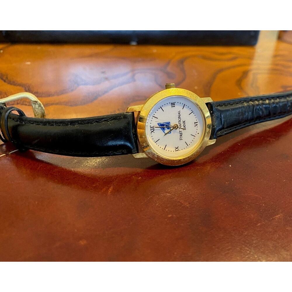 Women's 28mm Gold Tone Watch, First National Bank Logo, Black Leather Band